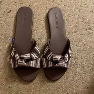 Rothy’s “The Knot” sandal in Taupe, size 10.